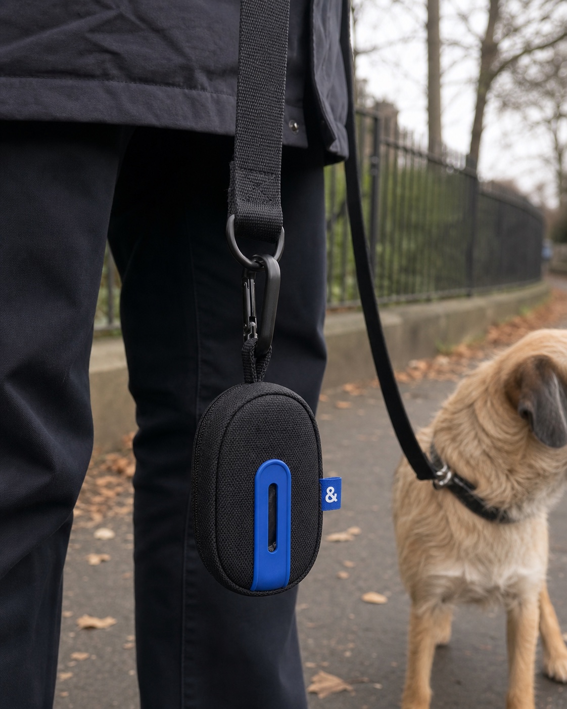 Cobalt and ink Bag Pod clipped to a matching dog lead
